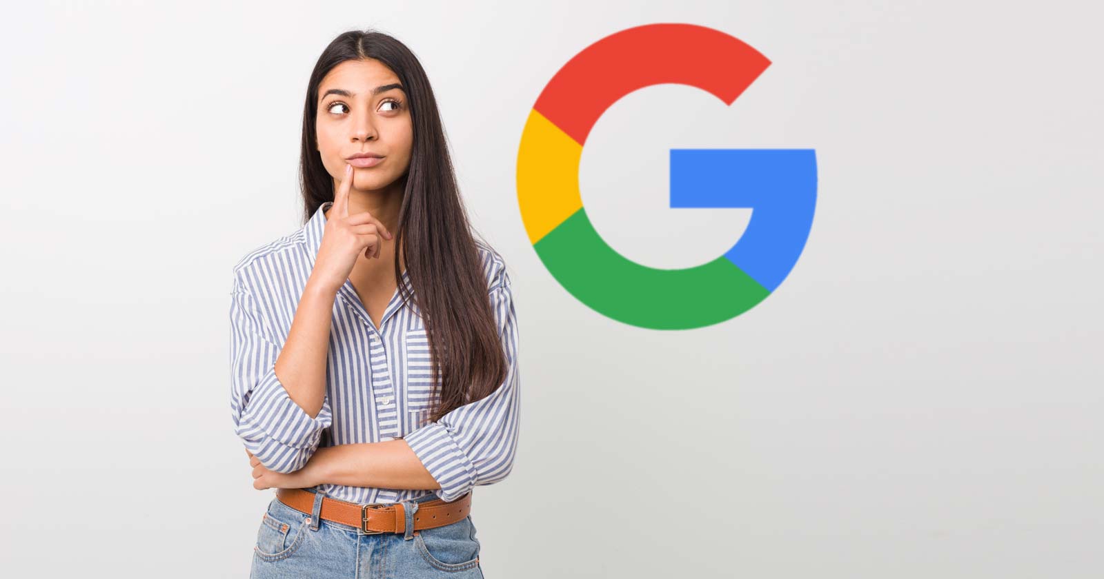 Image of a woman looking at the Google logo