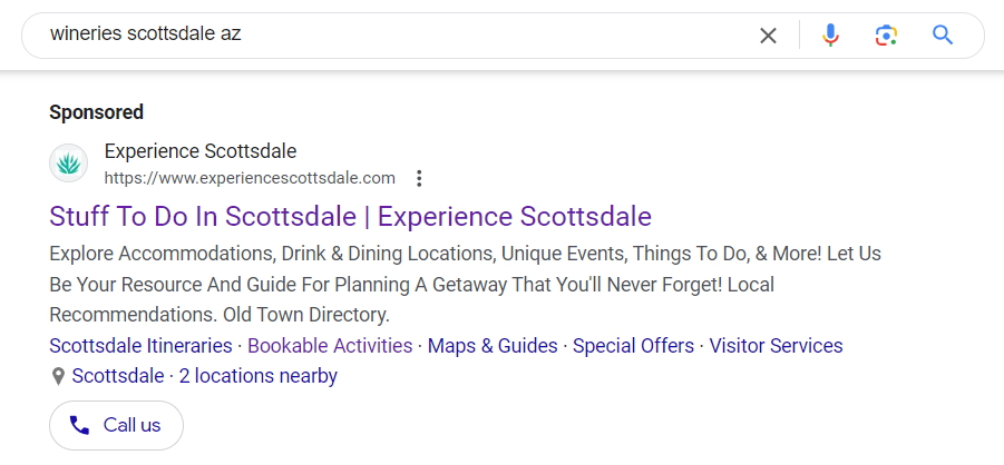 An example of a call asset on a desktop ad in Google search.