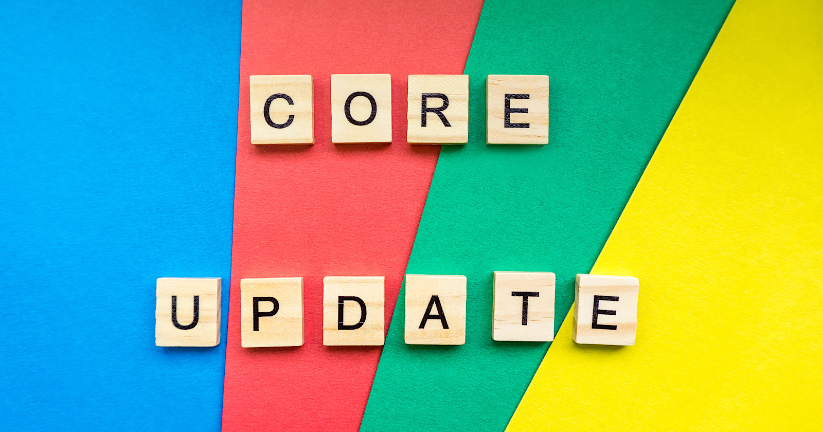 Core update text made with wooden letters on colorful background.